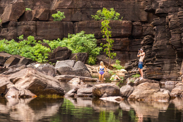 Travellers at a swimming hole in Kakadu