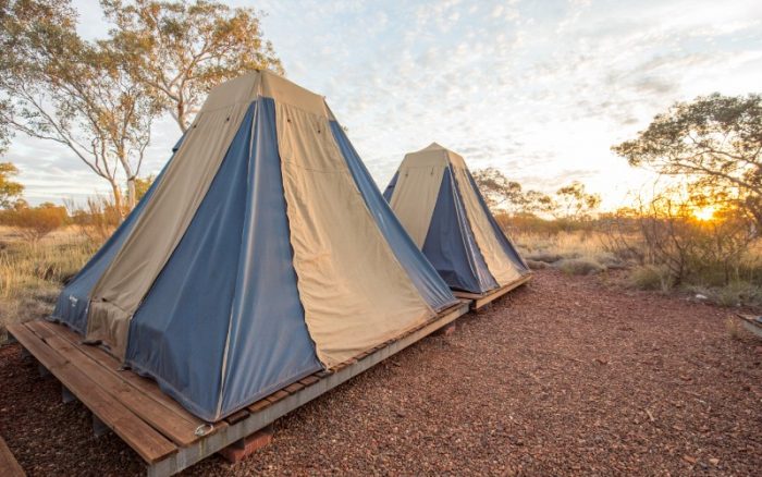 Two brown and blue tents in the outback in Karijini National Park