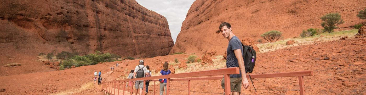 Travellers walking in the Red Centre