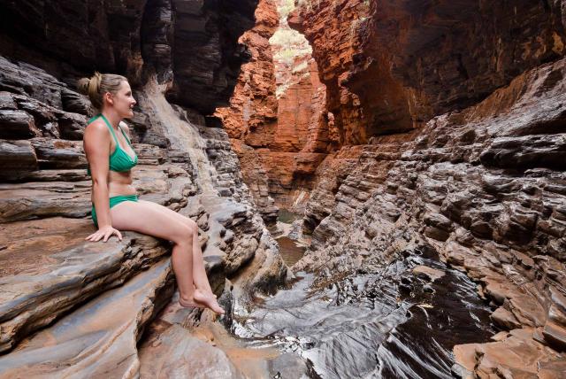 Woman at Karijini Gorge, Western Australia Woman at Karijini Gorge, Western Australia